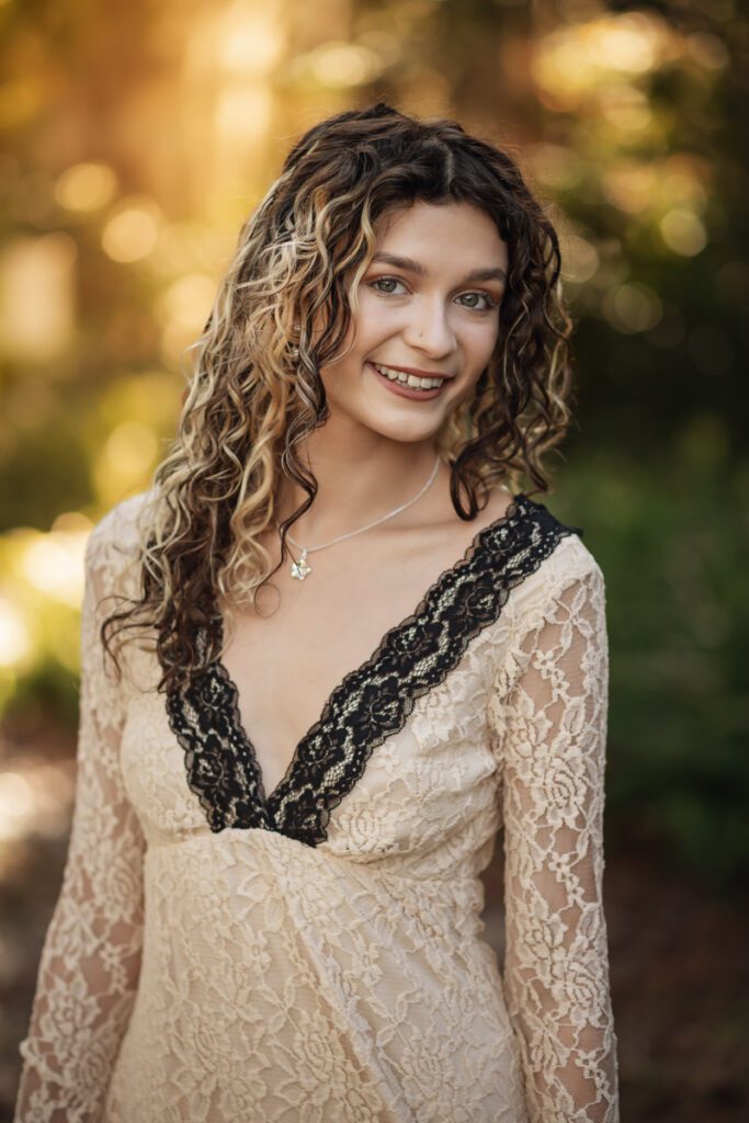 Close-up senior portrait highlighting natural confidence during a thoughtfully guided senior photo session in Orlando.