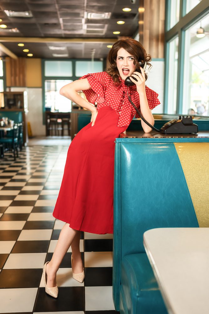 1950s-inspired senior portrait at Celebration Diner in Celebration Florida