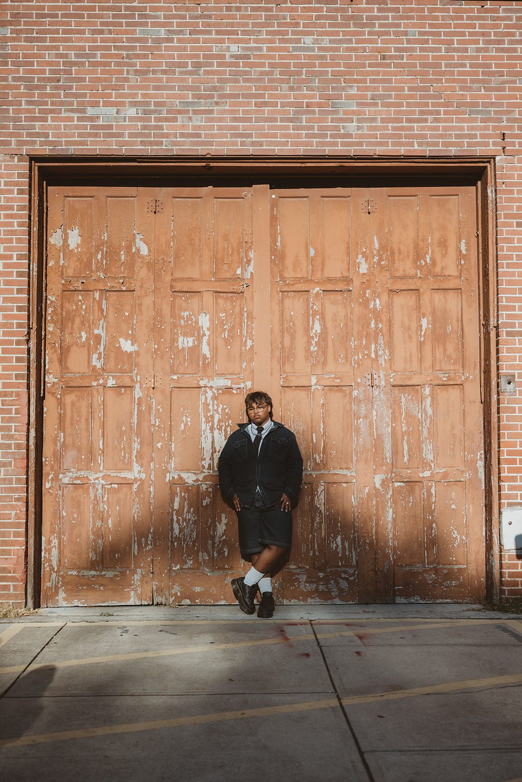 Senior guy in a denim jacket during an editorial shoot in Downtown Winter Garden