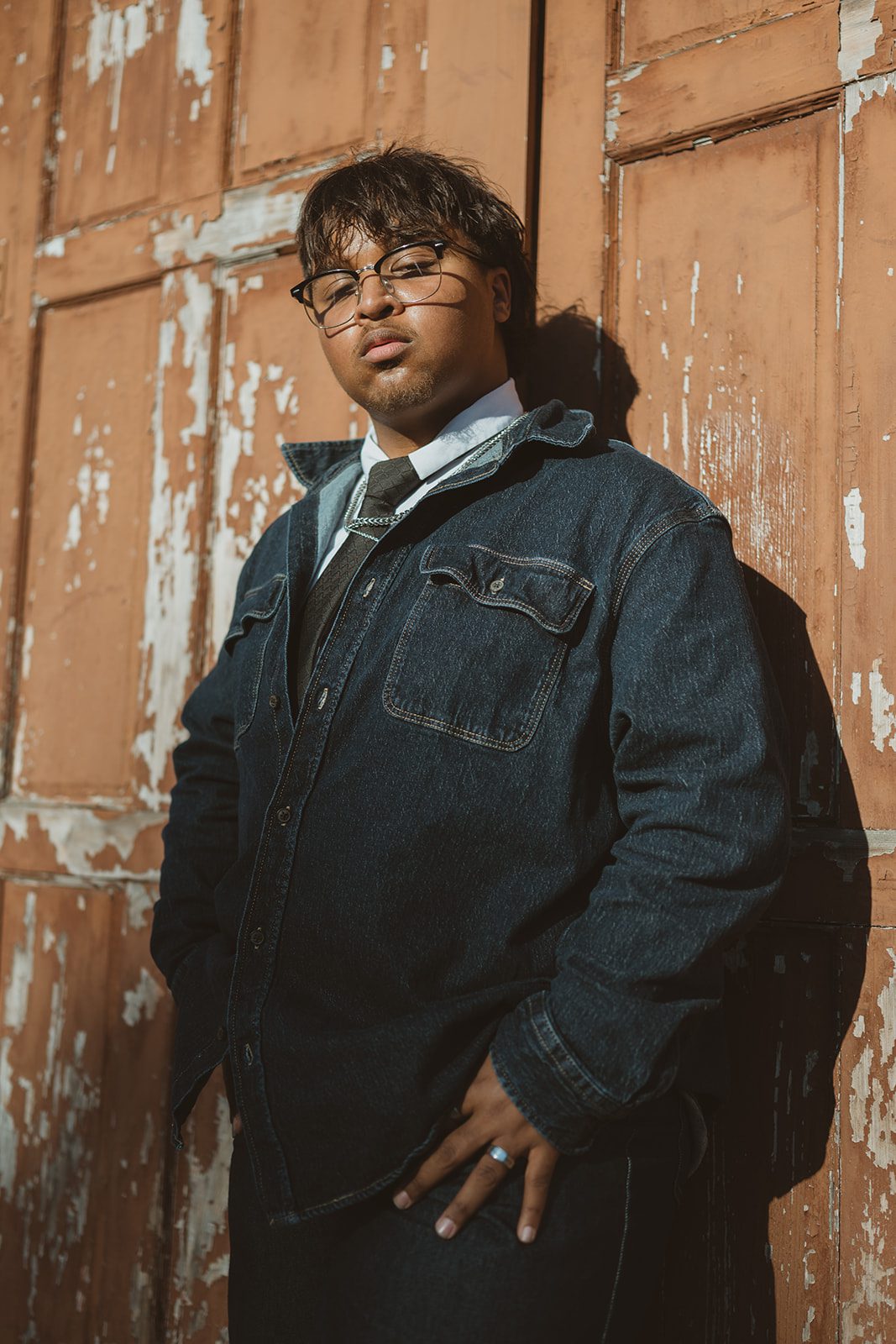 Downtown Winter Garden senior portrait featuring a denim outfit