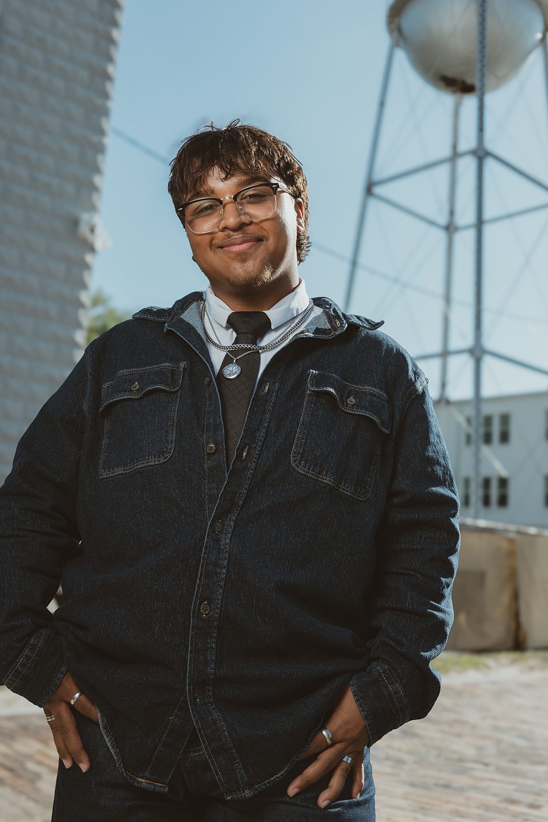 Senior guy posing on the Downtown Winter Garden parking garage steps