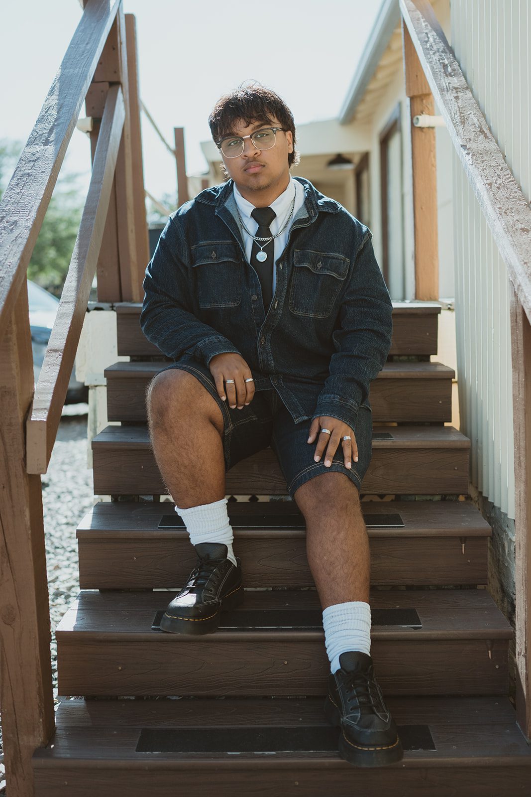 Senior guy posing near the historic train station in Downtown Winter Garden